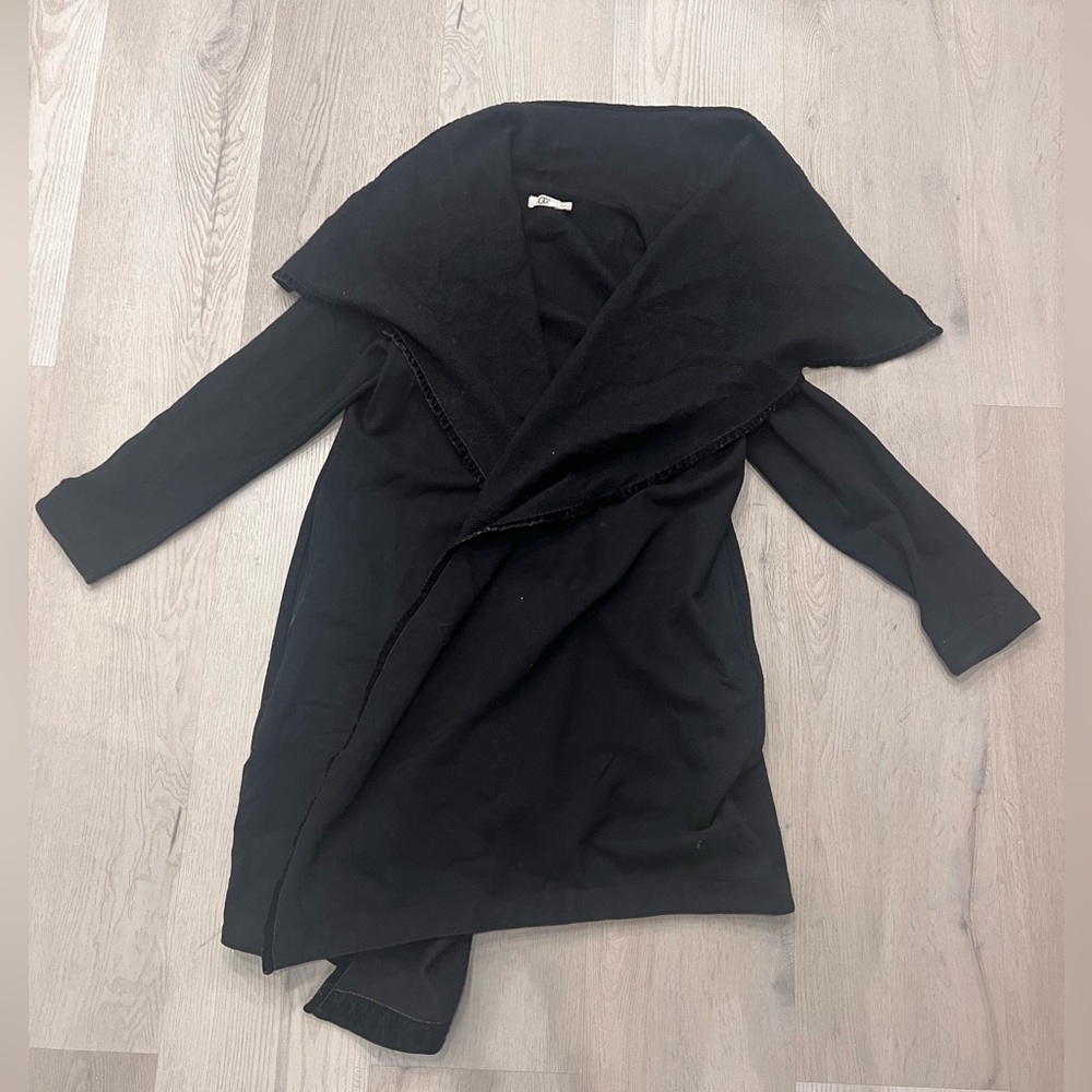 Original UGG jacket. Warm. Size L. Comes with belt.